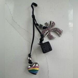 Coach Pink Bow, Dice, heart charm from Rogue 31